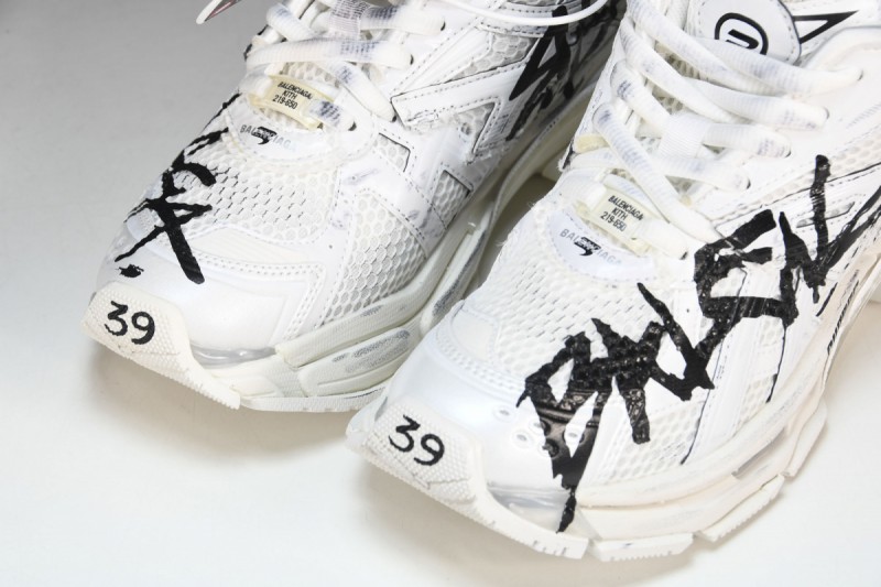 Balenciaga Graffiti Runner Sneakers in White/Black